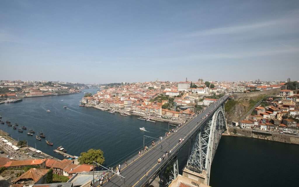 The upper deck of the Dom Luís I bridge with Porto's Ribeira along the Douro below